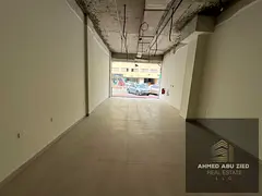 Spacious shop for rent in Al Hamidiya Ajman, opposite Garden City Towers, ceramic floor, civil defen