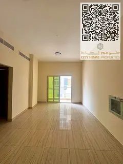 Two bedroom apartment for annual rent in Al Rashidiya 3 near Amina Hospital with balcony central AC