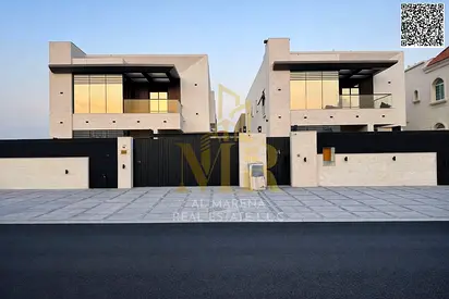 A villa with all-inclusive price (electricity, water, and air conditioning) on ​​the main street, ready to move in, in one of Ajman's most prestigious