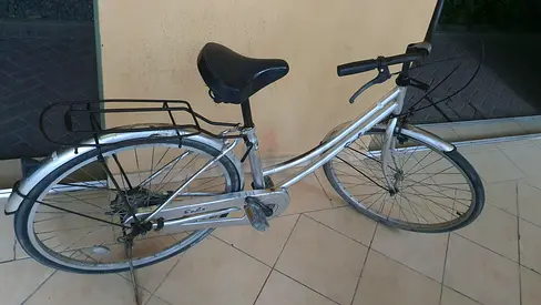 silver step-through commuter/cruiser bike - used