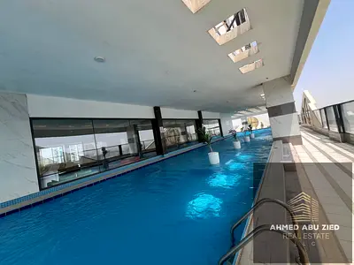 For annual rent: Two-bedroom apartment in Al Rashidiya 1 - 3 bathrooms - living room - balcony - gym,swimming pool,and aqua park-close to the Corniche