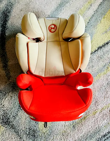 Gently used high-back booster car seat (red  beige)