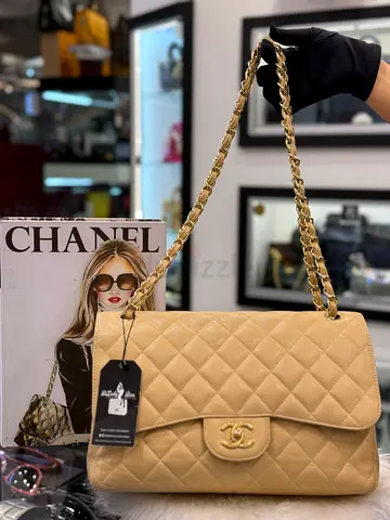 Chanel Beige Quilted Caviar Jumbo Classic Double Flap Bag (Authentic/PreOwned)