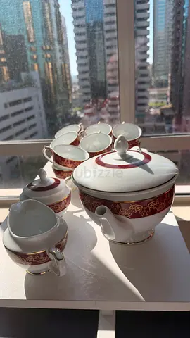 Porcelain tea set (teapot, 12 cups, sugar bowl  creamer)