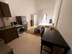 Furnished studio apartment for first occupancy, available for monthly rent in Al Muwaihat 3 - Centra