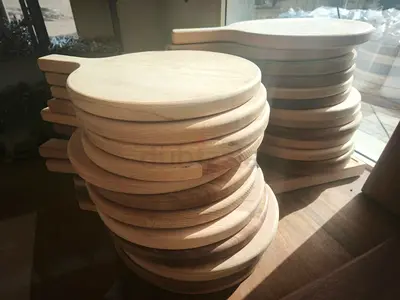 Stack of Wooden Cutting Boards and seleves