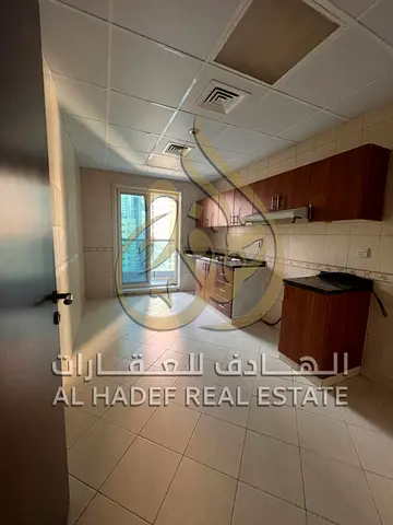 شقة للإيجار في التعاون الشارقة | غرفتين ماستر + صالة | 3 حمام | إطلالة مفتوحة | تكييف مجاني + جيم ومسبح