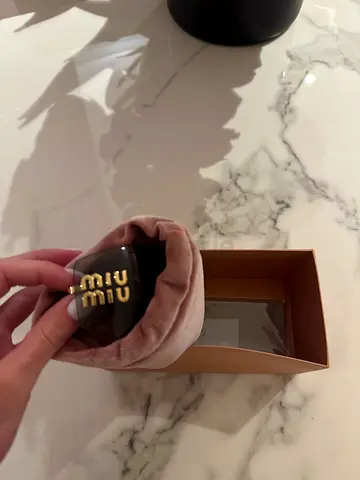 Miu Miu Stylish Sunglasses with Protective Case