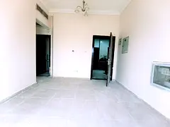 Spacious 1BHK with balcony and central AC near muwaileh park