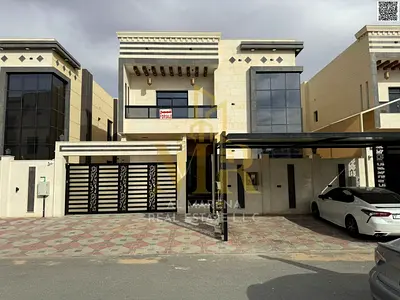 Luxury villa for sale in Al Bahia – Ajman | 5 master bedrooms | Includes water, electricity, and central air conditioning | Freehold ownership