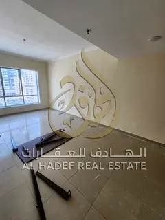 Two-bedroom apartment with a living room, balcony, storage room, and free parking in Al Khan – spa