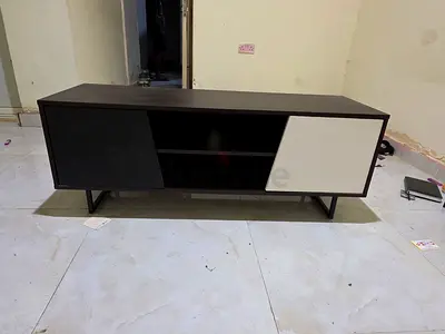 My modern black  white TV entertainment unit — good condition
