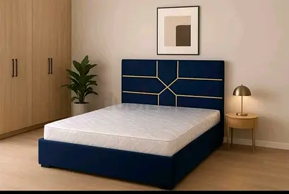 My dark blue upholstered bed frame with headboard steel design