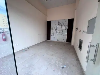 Shop for Annual Rent on Ajman Corniche: Spacious, High Ceilings, Deluxe Finishing, Prime Location