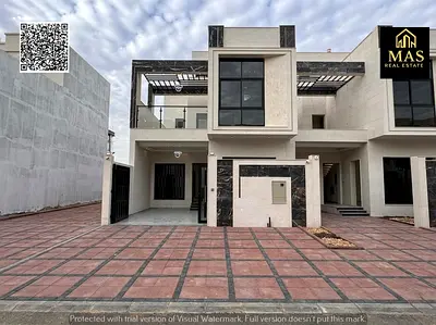 Townhouse villa for sale in Al Yasmin - Modern design, ground floor, first floor and roof with super deluxe finishes, including registration and owner