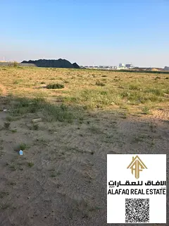 Land for Sale in Al Amrah with a large area and G+25 building permit Freehold for all nationalities
