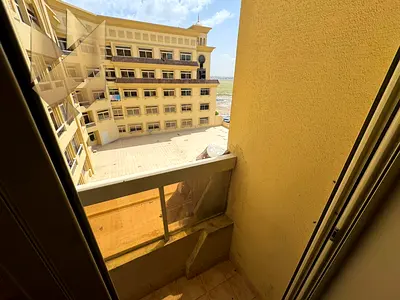 One bedroom and living room for rent in New Muwailih with balcony and parking