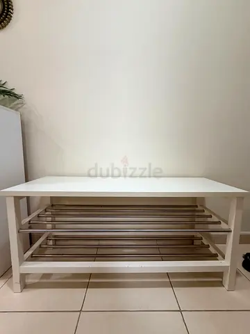White bench with shoe rack