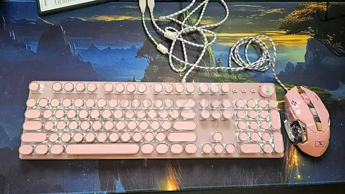 pink keyboard and mouse and mouse pad