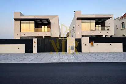 Stunning villa for sale, 5000 sq ft, including water, electricity, and air conditioning - Ajman, main street, freehold, open to all nationalities