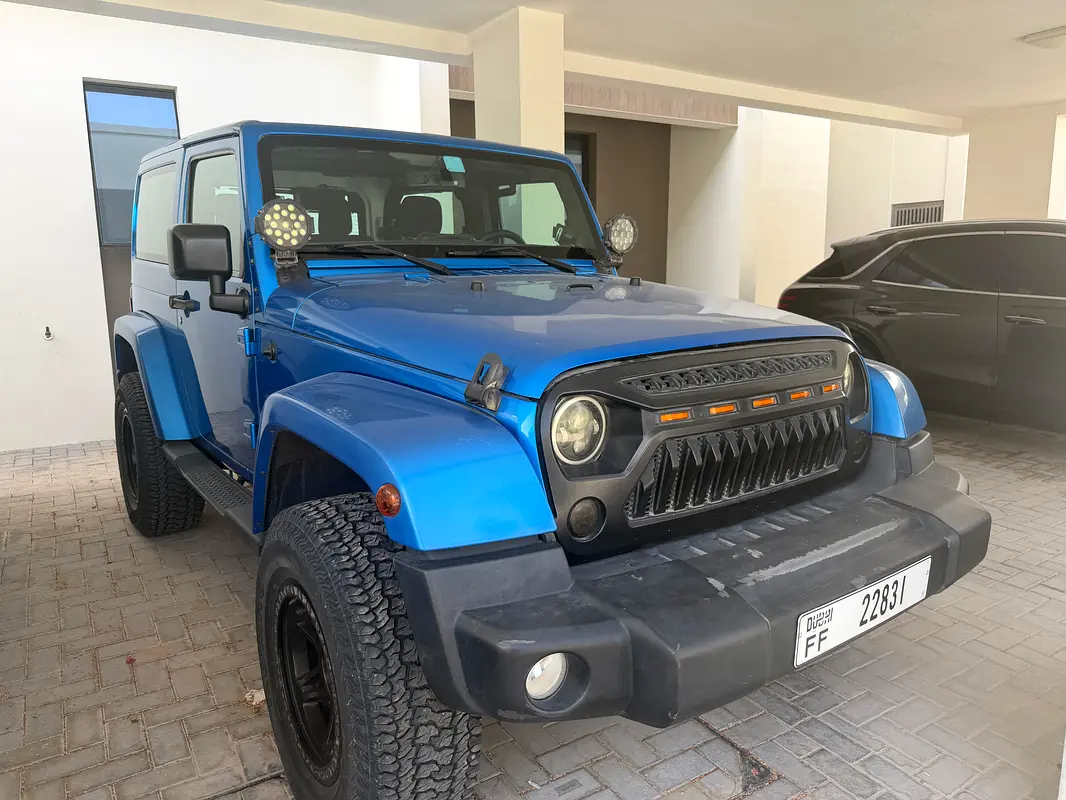 Jeep Wrangler 2014 — photo 1 of 3
