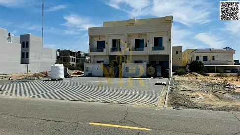 Villa for sale in Al Helio – Ajman, two floors and a roof | 5 master bedrooms | Central air conditioning | Includes registration and ownership fees, f