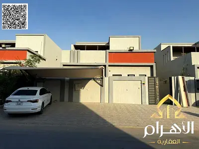Ready-to-move-in villa with air conditioning, water, and electricity in Al Yasmin, directly behind the mosque.