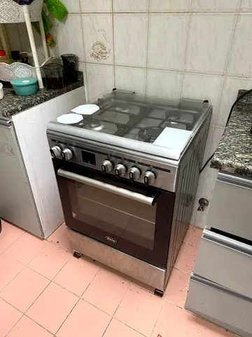 My 4-burner stainless steel gas stove  oven - working condition