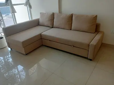 Beige L-shaped 3-seater sofa with chaise - good condition
