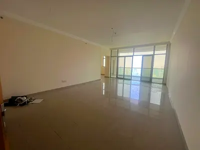 Luxury 4 Bedroom Apartment with a Spacious Living Room, Balcony with Sea View, Free Parking, Free AC, Free Gym & Swimming Pool in Al Majaz 3