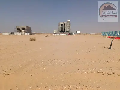 ارض تجارية للبيع مميزة علي شارع خورفكان ف السحمة - الشارقة