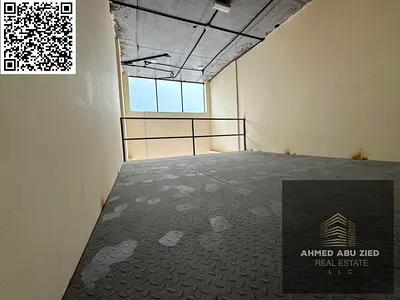 محل تجاري للإيجار في الجرف 1 عجمان مقابل مدرسة الأقصى – ميزانين ومساحة ممتازة – موقع حيوي مناسب لجميع الأنشطة