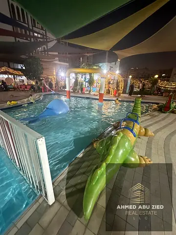 Luxury 1BR + living in Al Rashidiya 1 with gym, pool & aqua park. Master room, built-in wardrobes, balcony, open view, equipped kitchen + 1 month free