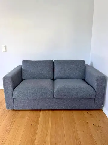 Gray 2-seater bed sofa - like new condition vimle