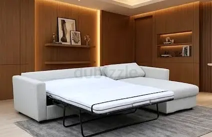Light grey L-shaped sofa bed – pull-out sleeper