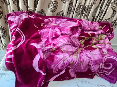 My plush floral blanket – purple in flawless condition Size is small for single bed use......