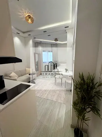 استوديو مفروش | نورا ريزيدنس JVC | تصميم حديث ذو مخطط مفتوح