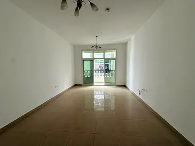 Spacious master 1BHK in Al Majarah, modern tower, balcony, no fees, rent AED 37,000 yearly with easy payments.
