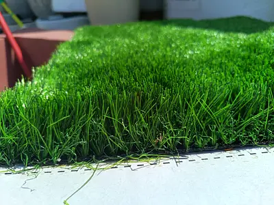 Brand new green artificial grass turf