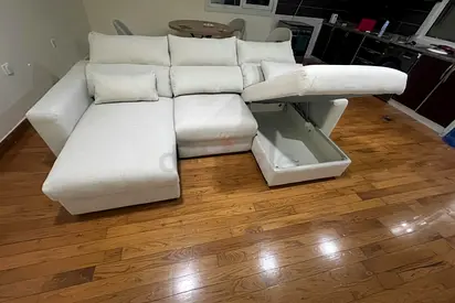 Beige eskilstuna L shape sofa bed in excellent condition