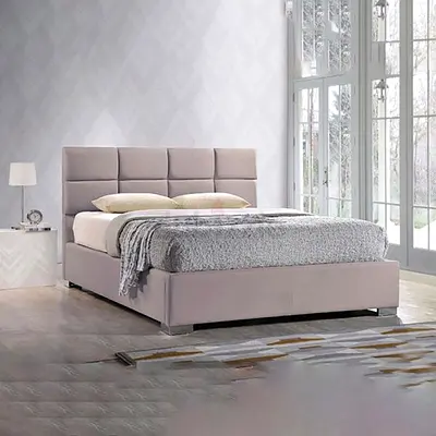 Light grey upholstered King Size platform bed with padded headboard