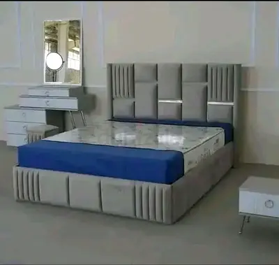 My brand new gray upholstered bed with tall panel headboard