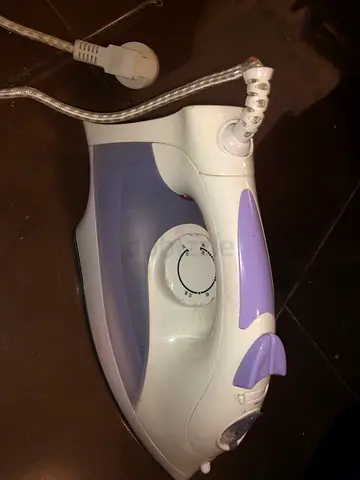 Used Steam Iron for Sale with free board