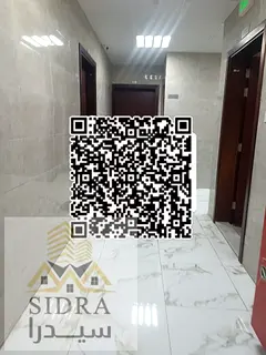 The apartment is in Al-Aliya, Ajman, on Sheikh Zayed Road, near Al-Humaidi Park.