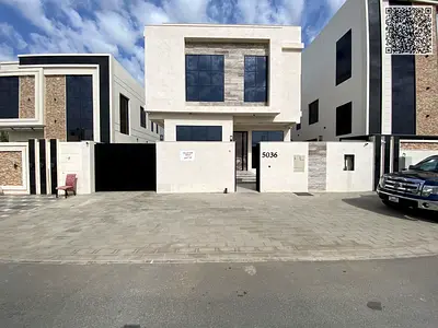 Luxury villa for sale in Al Yasmin, high-end stone finishing, registration fees included