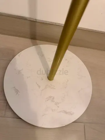 Gold plated clothes hanger stand  with white marble base