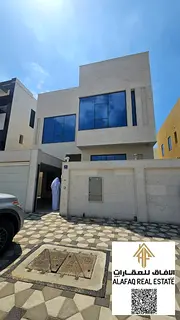 Commercial villa for rent in Al Yasmeen five bedrooms seven bathrooms maid room reception hall majli