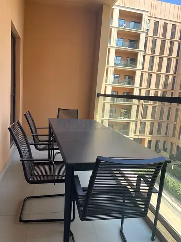 Black Outdoor Dining Set - Metal Table with 6 durable Chairs.