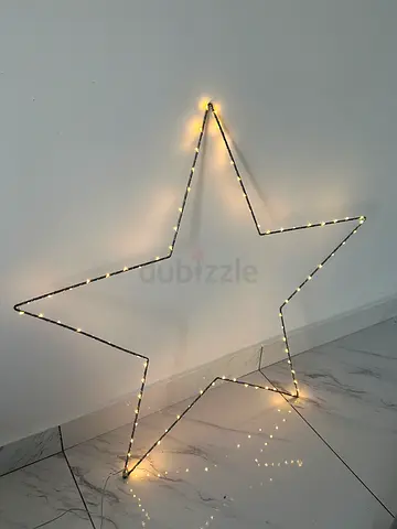 Large star-shaped LED wall light (warm white) - decorative