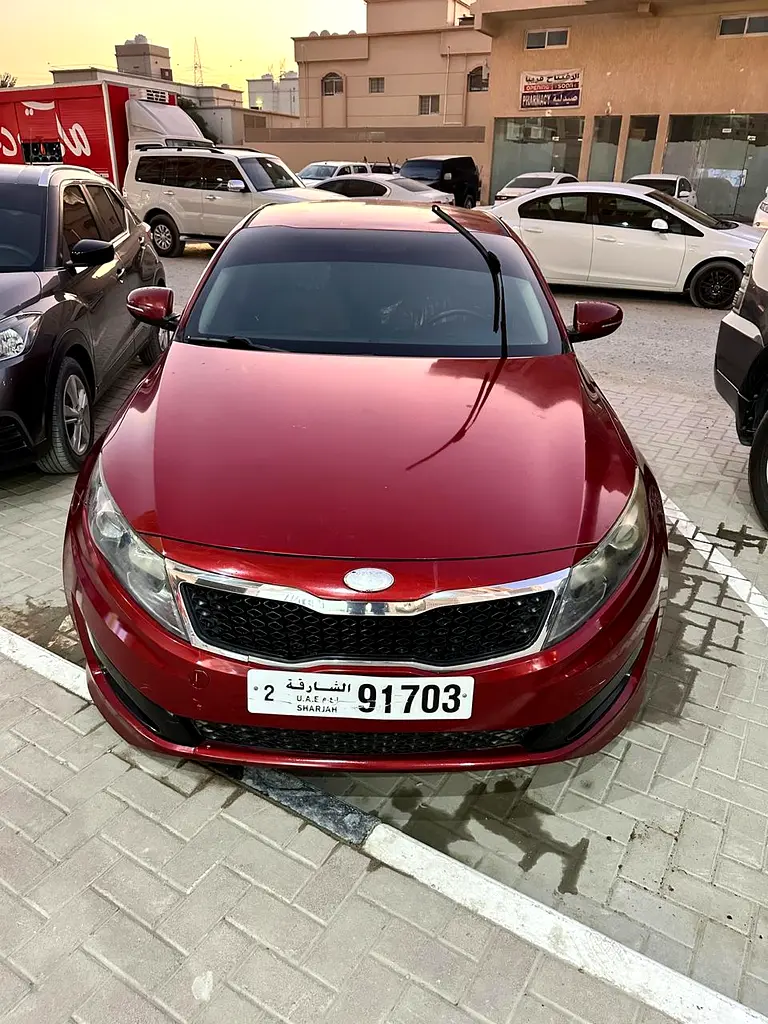 Kia Optima 2011 — photo 1 of 12